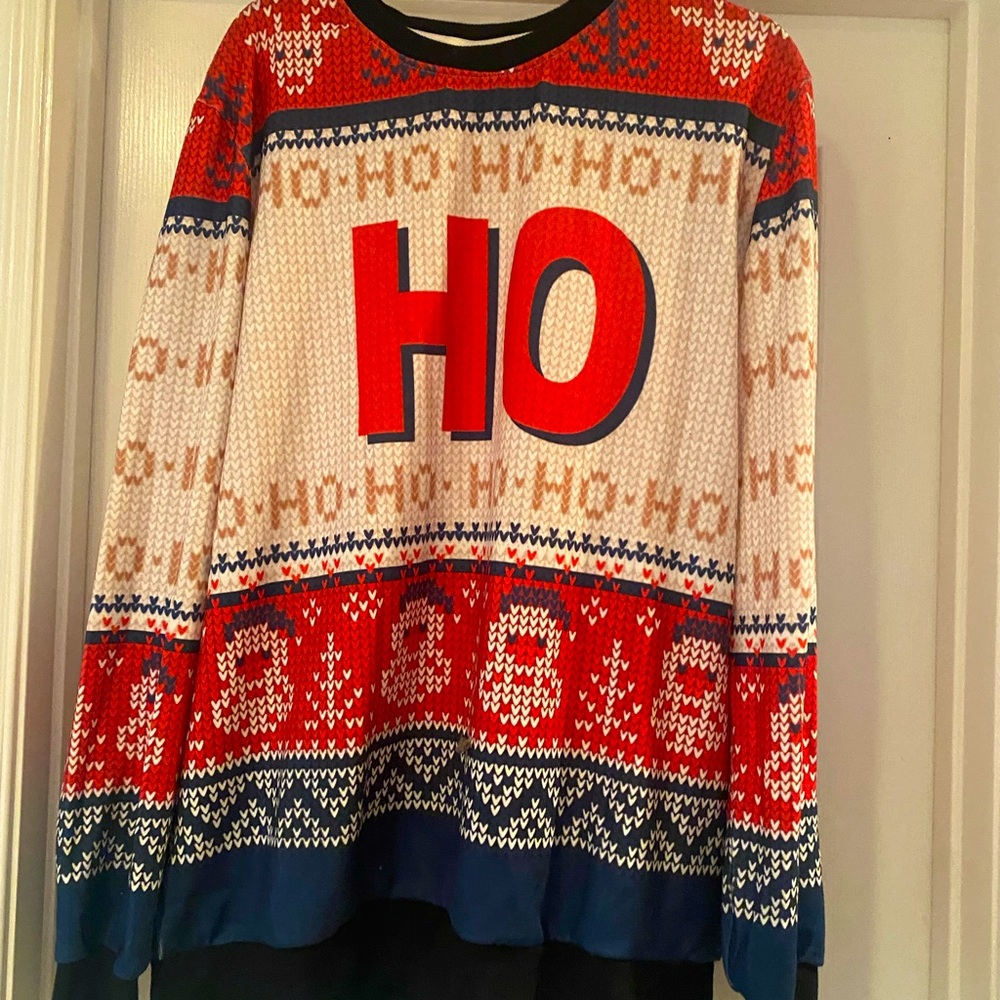 Christmas shirt. Woman’s med but runs very big. Never worn